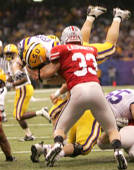 OSU's James Laurinaitis prevents Jacob Hester from scoring in the second quarter Monday, January 7, 2008, in the BCS National Championship game.