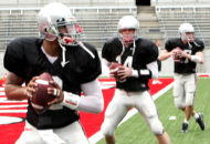From left, Terrelle Pryor, Joe Bauserman and Justin Siems are the three quarterbacks who will see playing time in Saturday's spring scrimmage at Ohio Stadium. Siems, a walk-on whose name was unknown to Jim Tressell just a few weeks ago, is providing needed relief for Pryor at a short-handed position this spring. Photo: Terry Gilliam Associated Press