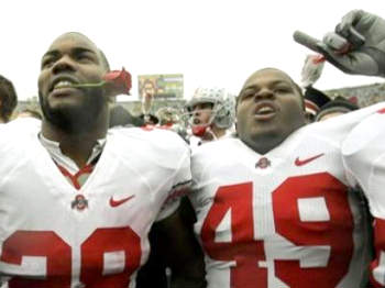 Chris Wells (28) and Dionte Johnson (49) celebrate the Buckeyes win over TSUN and look forward to the Rose Bowl, the Buckeyes first since 1997.