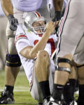 Battered and beaten, Ohio State QB Todd Boeckman needed some help to rise off the Coliseum field during Saturday night's defeat.