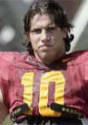 USC LB Brian Cushing has overcome a litany of injuries and wears a cast to protect a chipped bone in his left wrist.
