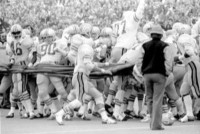 Ohio State players tear down the 'Go Blue' banner prior to the start of the 1973 game in Ann Arbor